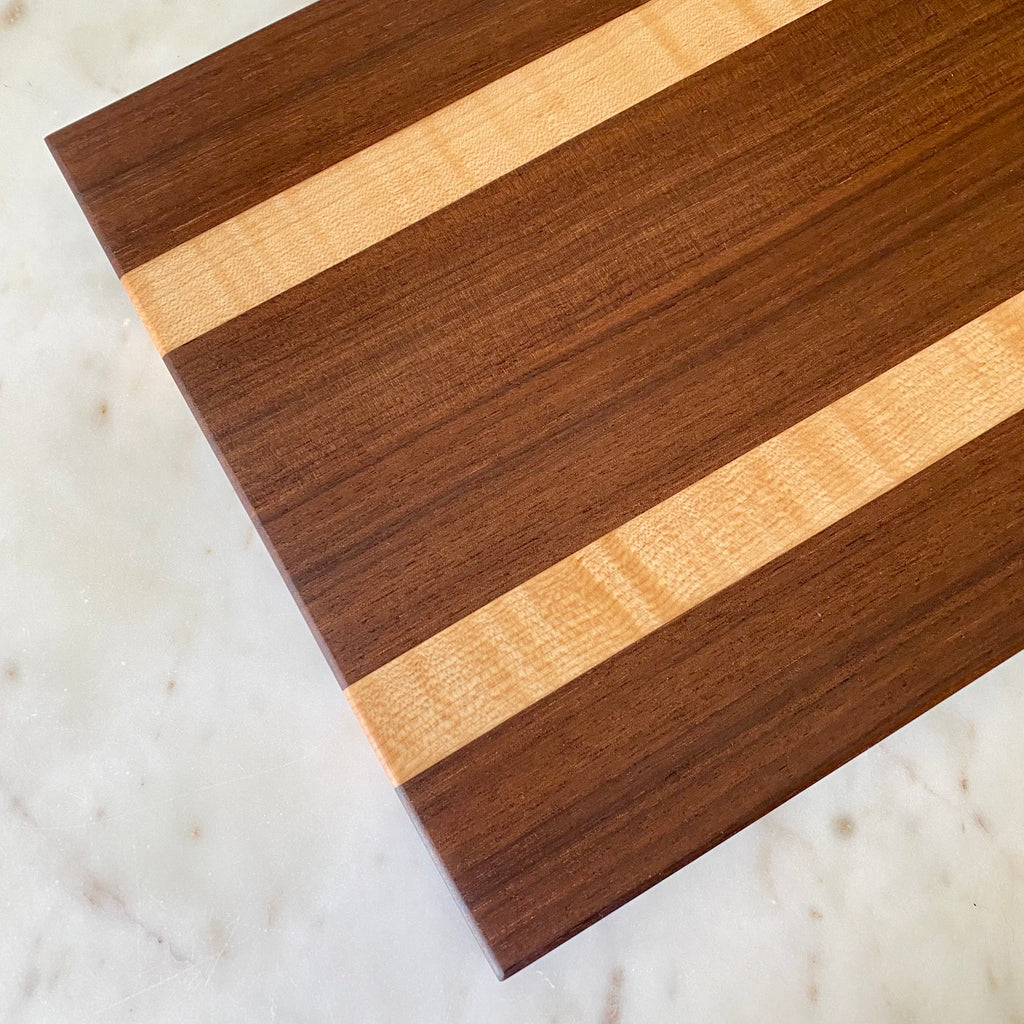 curly maple and black walnut cutting charcuterie board close fleming & cazalas